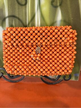 Wood Beaded Orange Clutch with Charm Accent